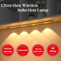 UltraGlow rechargeable motion-sensor LED light, 2-pack, mounted under a kitchen cabinet